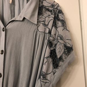 Ankle length, button down dress.